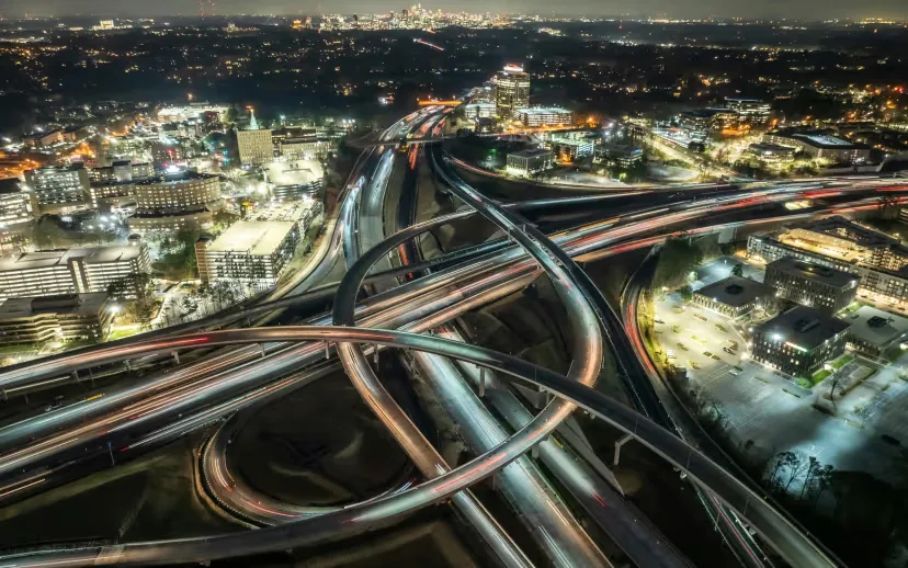 Connected highway interchanges at night